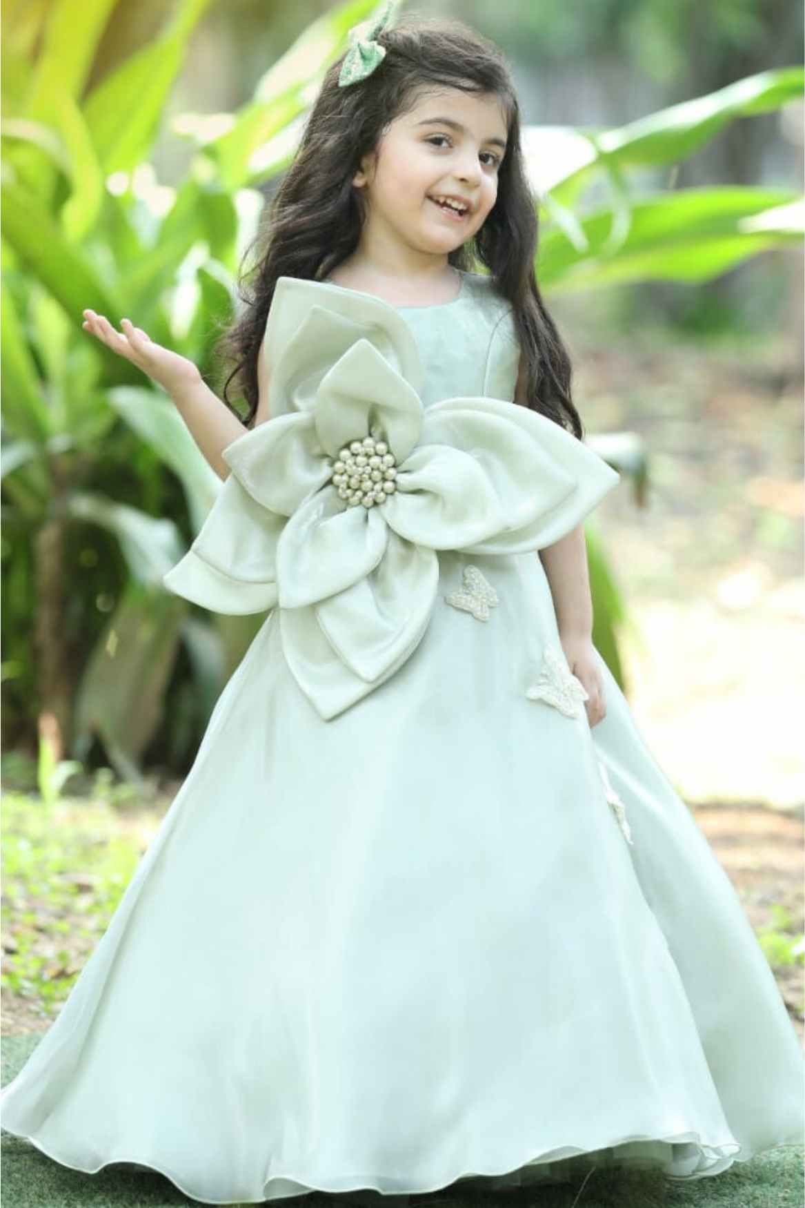 Mint Green Sleeveless With Floral And Butterfly Embellished Gown For Girls