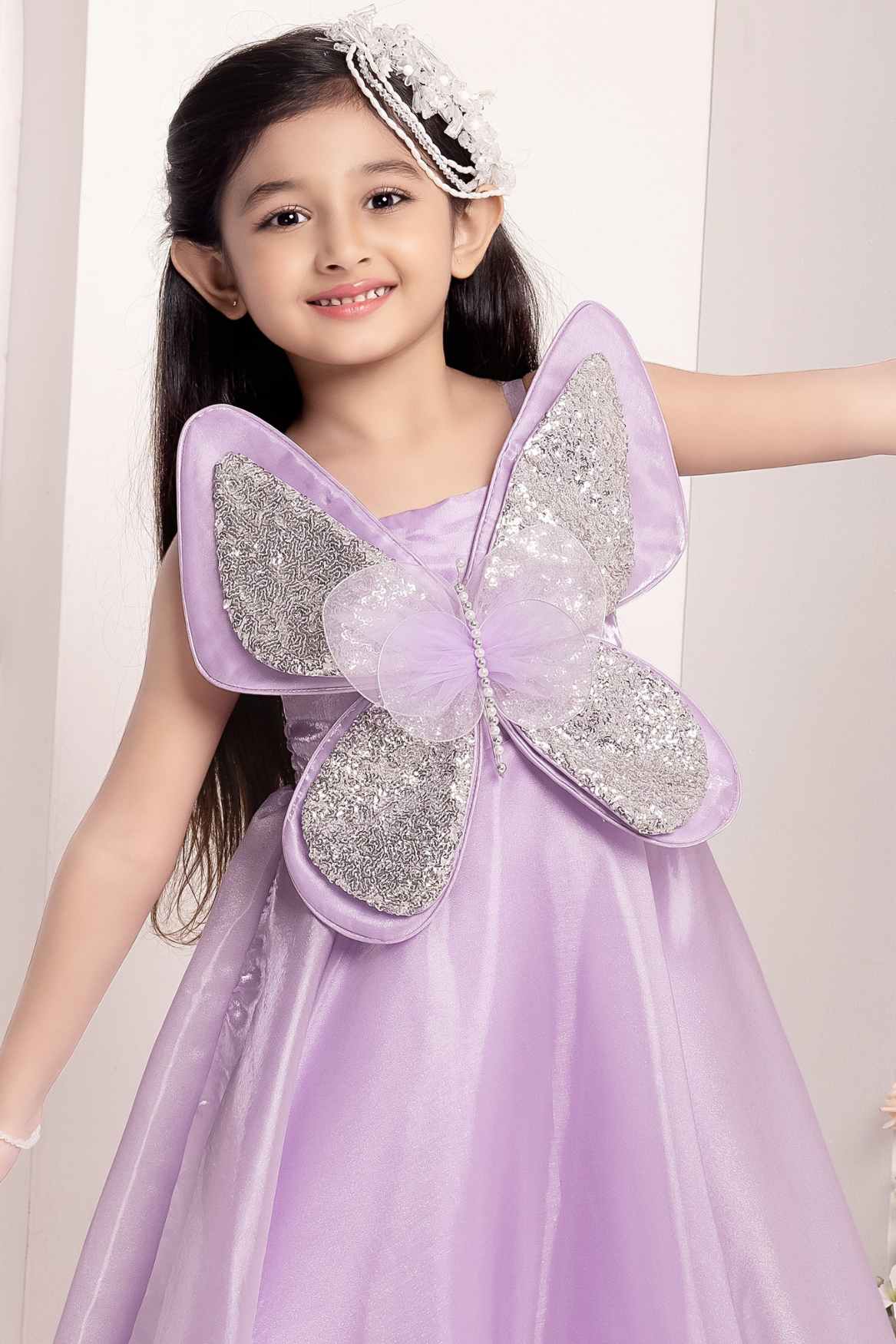 Lilac Butterfly Embellished With Sequins And Pearl Work Gown For Girls