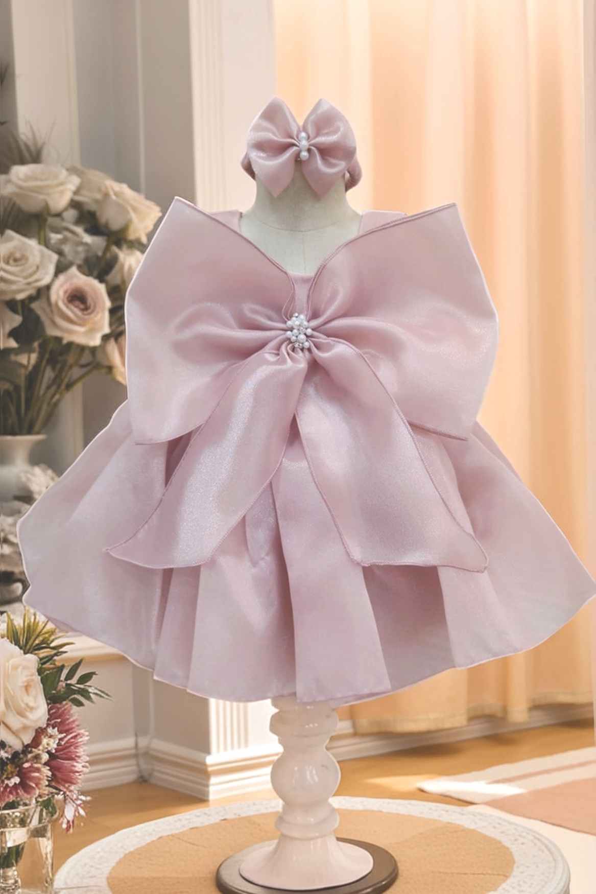 Peach Sleeveless And Bow Embellished With Pearls Work Frock For Girls