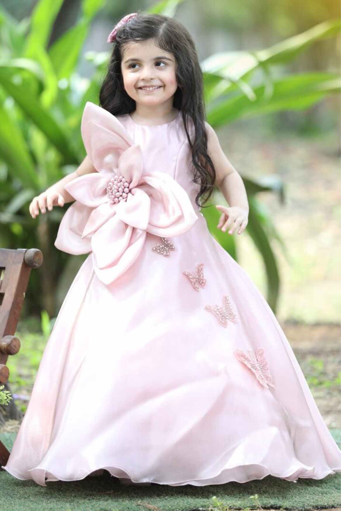 Peach Sleeveless With Floral And Butterfly Embellished Gown For Girls