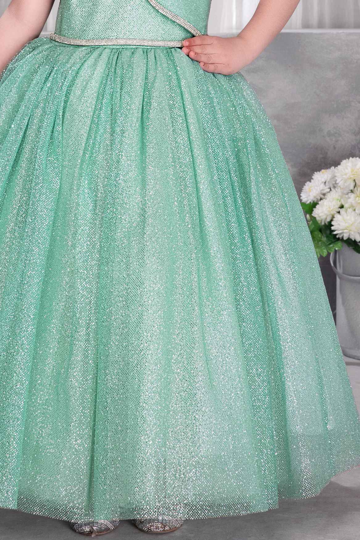 Green Sleeveless And Bow Embellishment With Stone Worked Gown For Girls