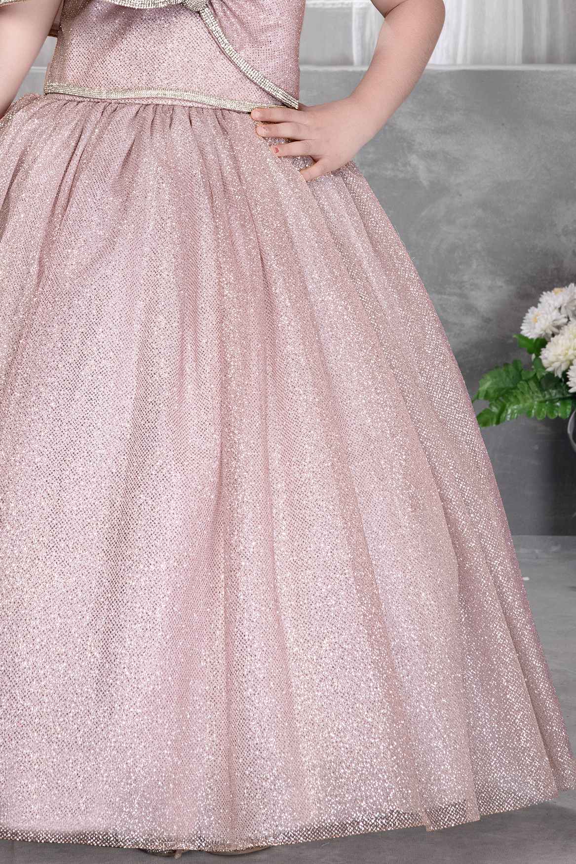 Onion Pink Sleeveless And Bow Embellishment With Stone Worked Gown For Girls