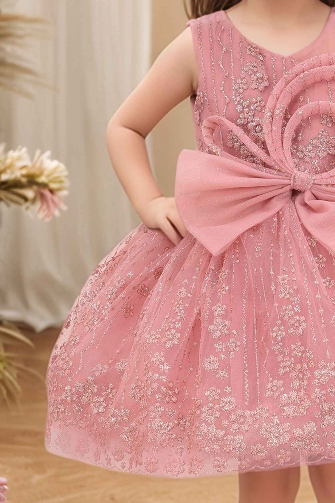 Peach Frock With Bow Embellished And Shimmer Printed For Girls