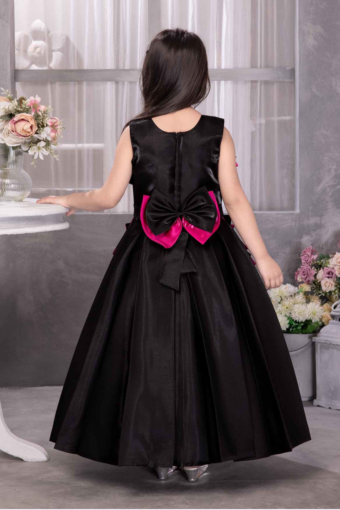 Black Sleeveless With Bow Embellished Gown For Girls