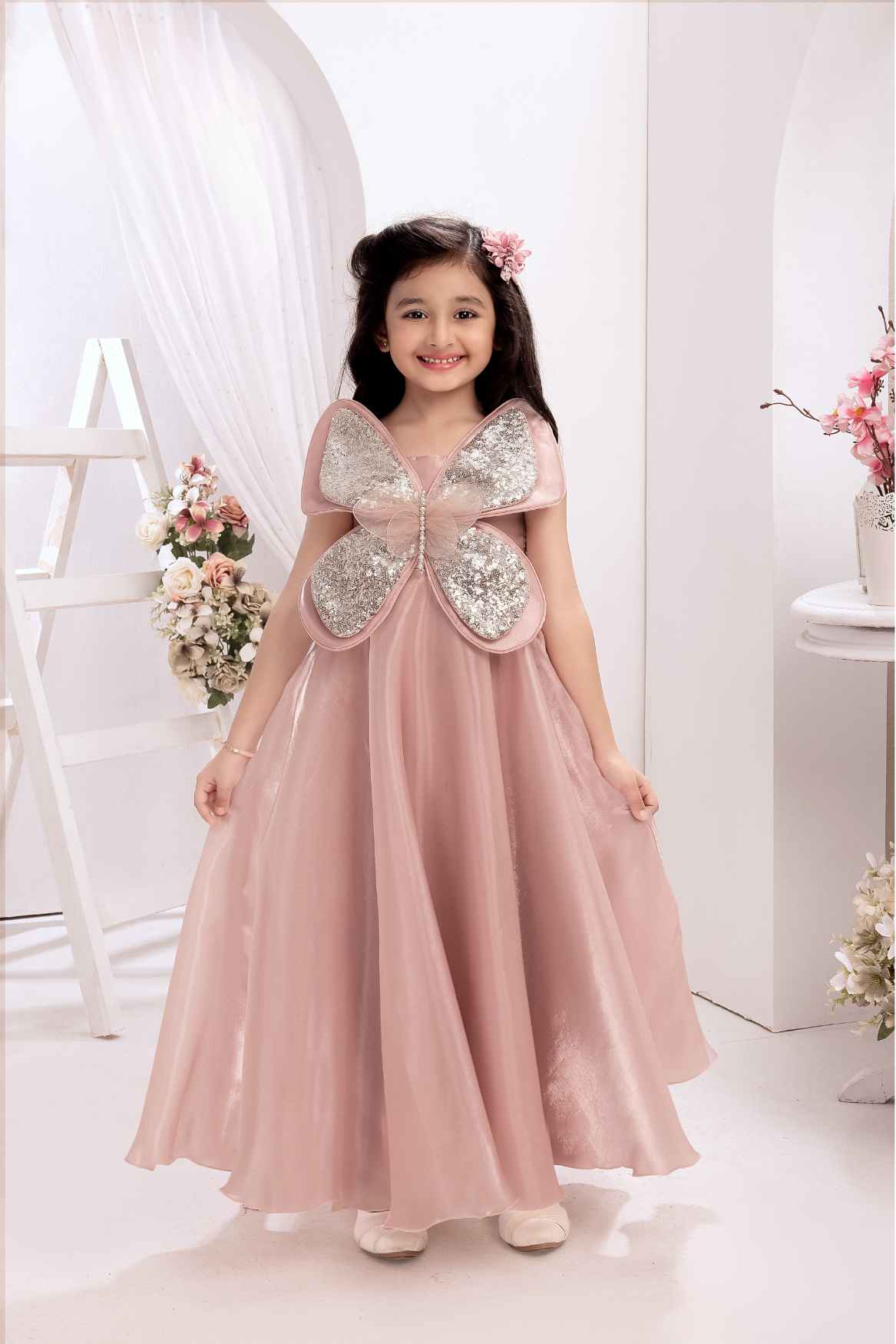 Peach Butterfly Embellished With Sequins And Pearl Work Gown For Girls