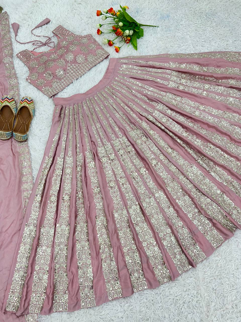 Designer Wedding Wear Peach color Lehenga Choli with Heavy Embroidery Sequence Work